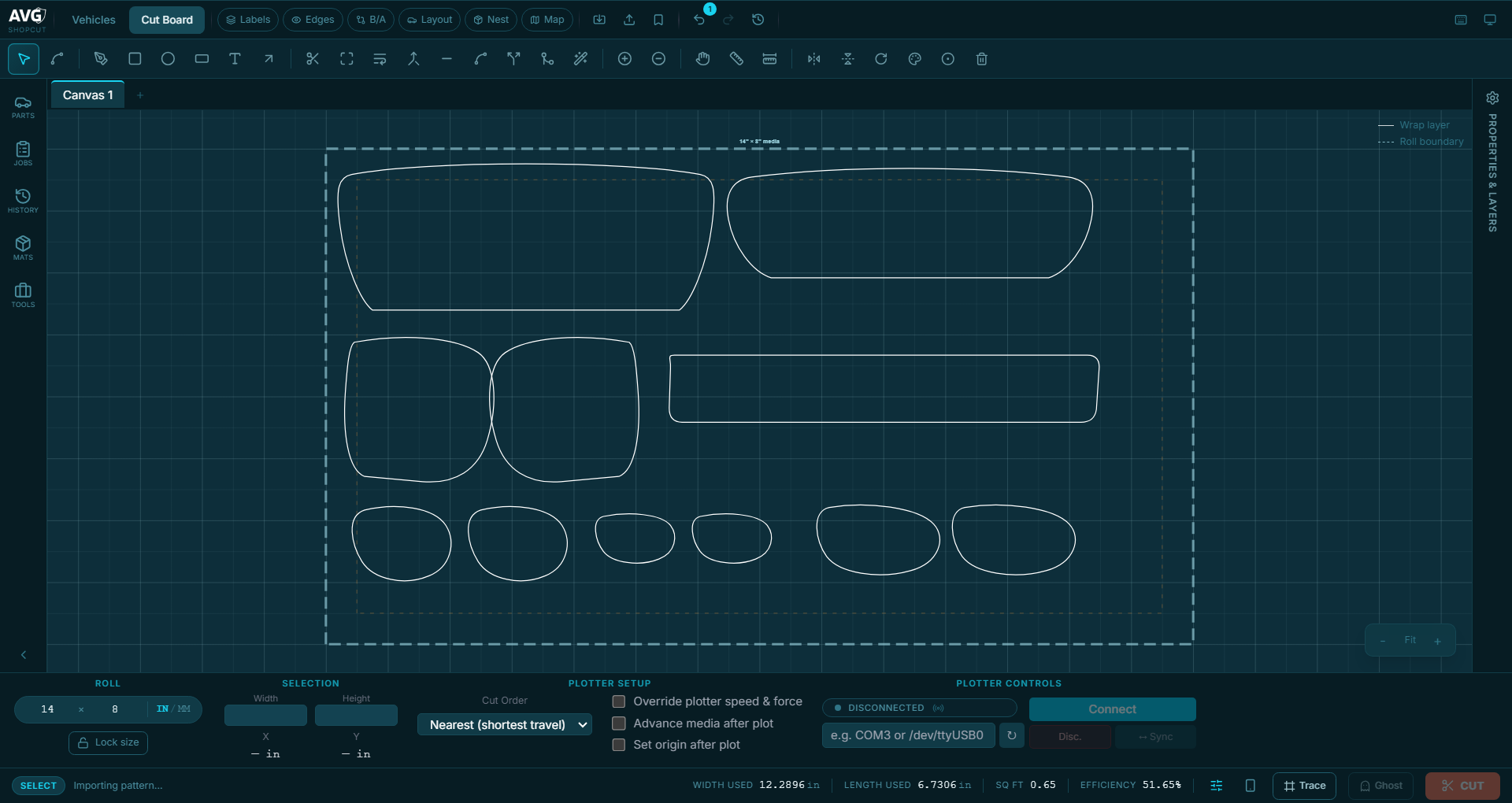 The ShopCut cut board with vehicle panels laid out on the roll, showing material used and cutting efficiency